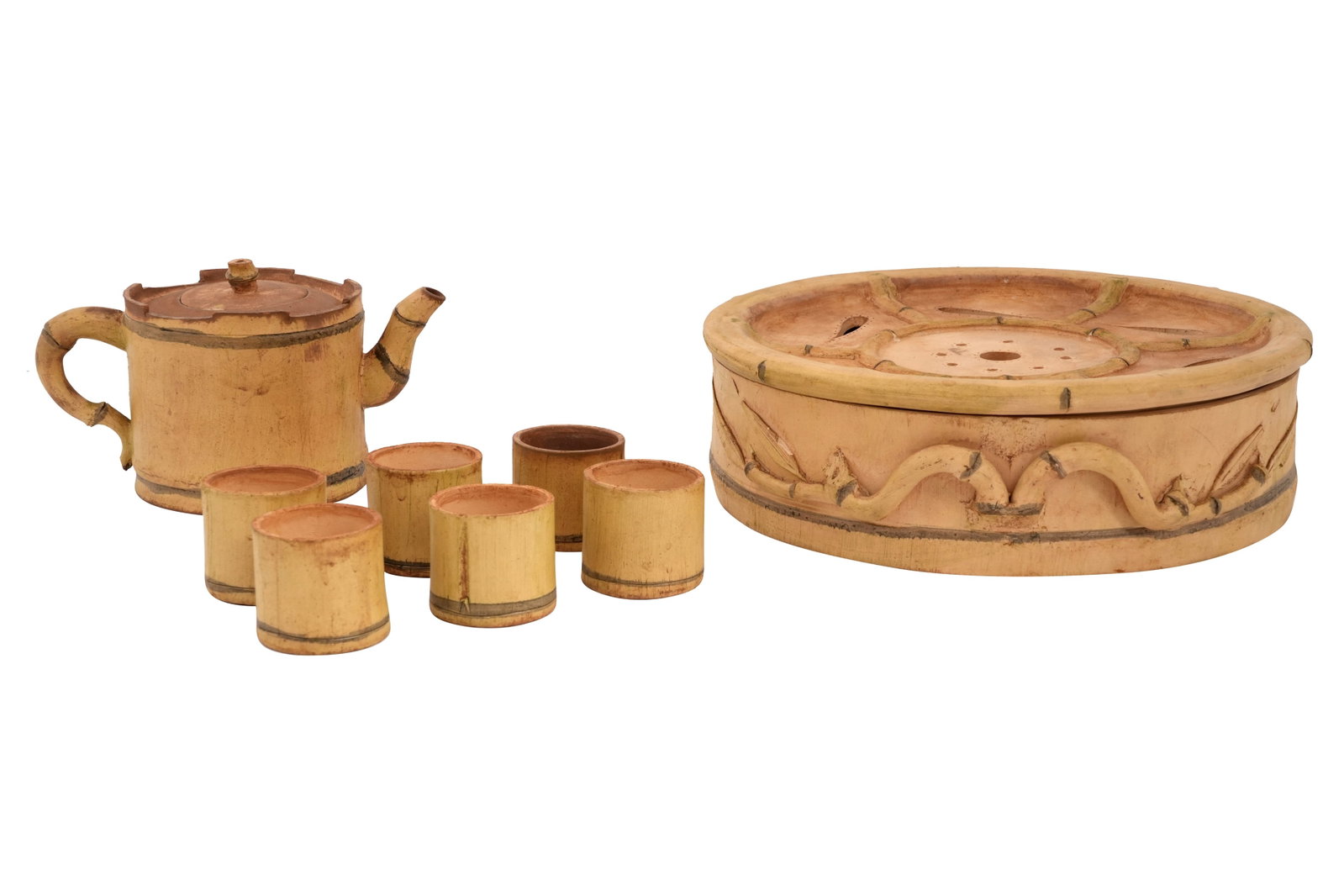 A CHINESE YIXING ZISHA TEA SET BY ZHOU DINGFANG (1965 - ) 2016: A CHINESE YIXING ZISHA TEA SET BY ZHOU DINGFANG (1965 - ) 2016 Including a teapot and cover, a circular box and cover and six teacups, each piece formed to resemble bamboo stem, worked from a pale yel