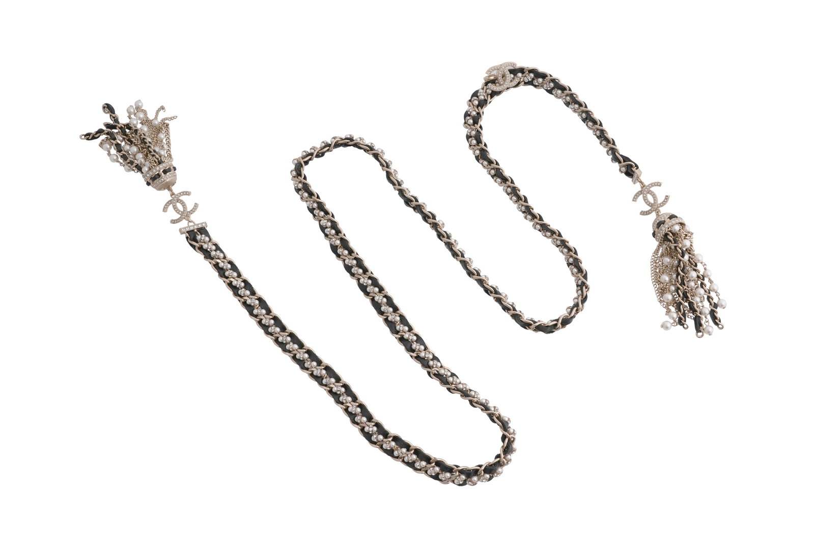 A BOXED CHANEL CRYSTAL, FAUX PEARL, LEATHER AND GILT METAL TASSEL NECKLACE Made in France, c.2010s: A BOXED CHANEL CRYSTAL, FAUX PEARL, LEATHER AND GILT METAL TASSEL NECKLACE Made in France, c.2010s A striking Chanel long statement necklace comprising multiple strands of