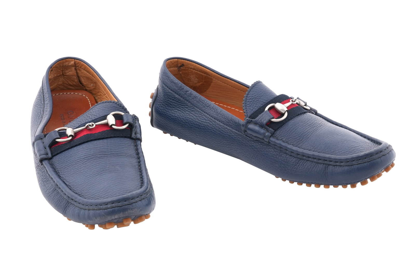 A PAIR OF MEN'S GUCCI NAVY LEATHER HORSEBIT DRIVING LOAFERS WITH WEB DETAIL Made in Italy, c.2020,: A PAIR OF MEN'S GUCCI NAVY LEATHER HORSEBIT DRIVING LOAFERS WITH WEB DETAIL Made in Italy, c.2020, size UK 9.5 / EU 43.5 A refined and highly wearable pair of men’s driving loafers by Gucci, crafted