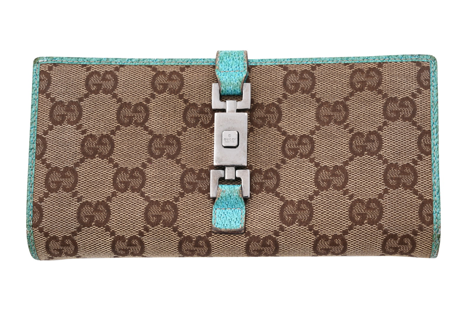 A GUCCI 'GG' CANVAS AND TURQUOISE LEATHER JACKIE CLASP WALLET Made in Italy, c.1990s: A GUCCI 'GG' CANVAS AND TURQUOISE LEATHER JACKIE CLASP WALLET Made in Italy, c.1990s A stylish Gucci bi-fold wallet with pocket crafted in the house’s iconic beige and brown 'GG' monogram canvas, tr