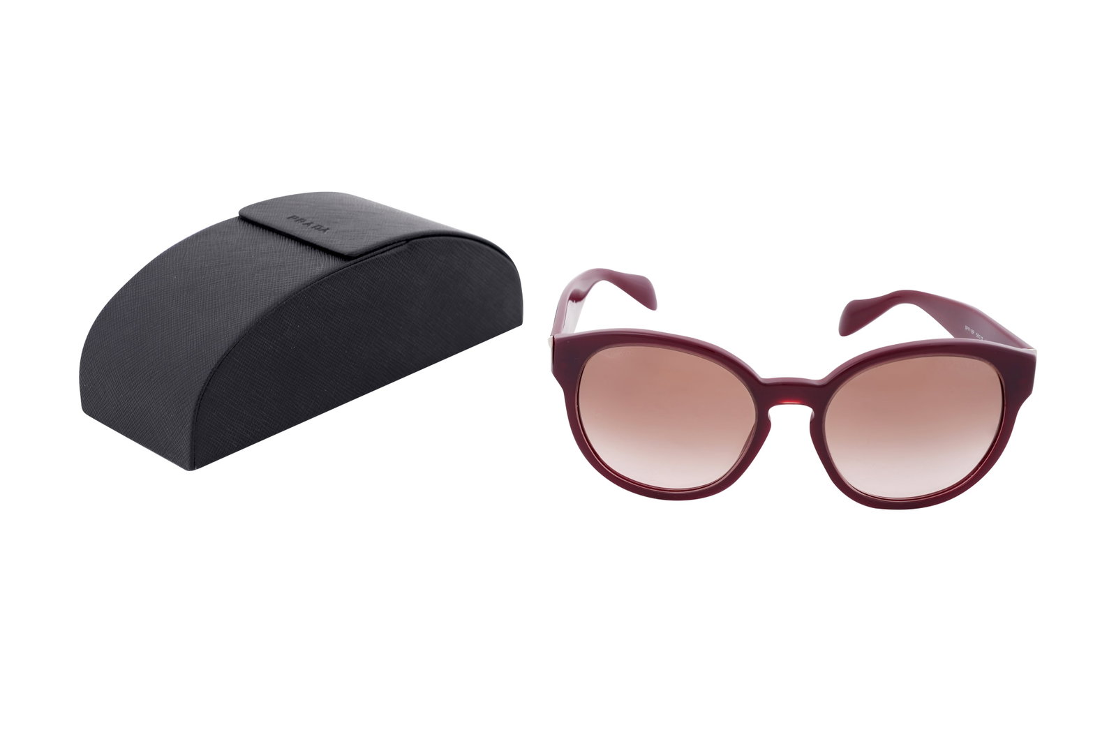 A PAIR OF PRADA BURGUNDY ACETATE SUNGLASSES Made in Italy: A PAIR OF PRADA BURGUNDY ACETATE SUNGLASSES Made in Italy A stylish pair of Prada sunglasses, model SPR 18R, featuring oversized rounded frames in translucent burgu