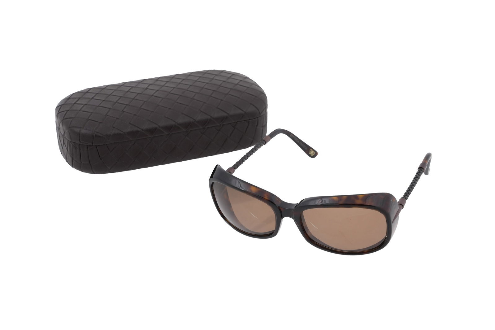 A PAIR OF BOTTEGA VENETA OVERSIZED SUNGLASSES Made in Italy, early 21st century: A PAIR OF BOTTEGA VENETA OVERSIZED SUNGLASSES Made in Italy, early 21st century An elegant pair of oversized Bottega Veneta sunglasses, executed in a rich dark brown acetate with softly graduated l