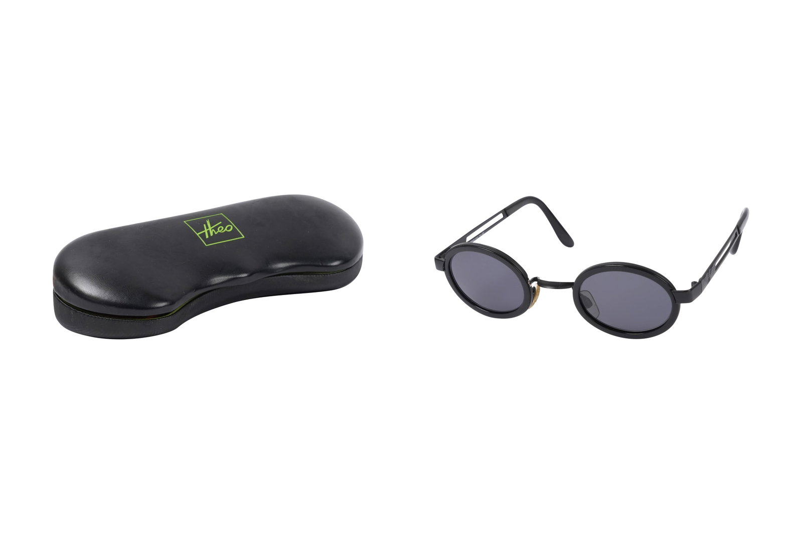 A PAIR OF EMPORIO ARMANI MODEL 557-S ROUND SUNGLASSES Made in Italy, late 1990s-early 2000s: A PAIR OF EMPORIO ARMANI MODEL 557-S ROUND SUNGLASSES Made in Italy, late 1990s-early 2000s A pair of Emporio Armani sunglasses, model 557-S, featuring small round lenses set within slim black frames,