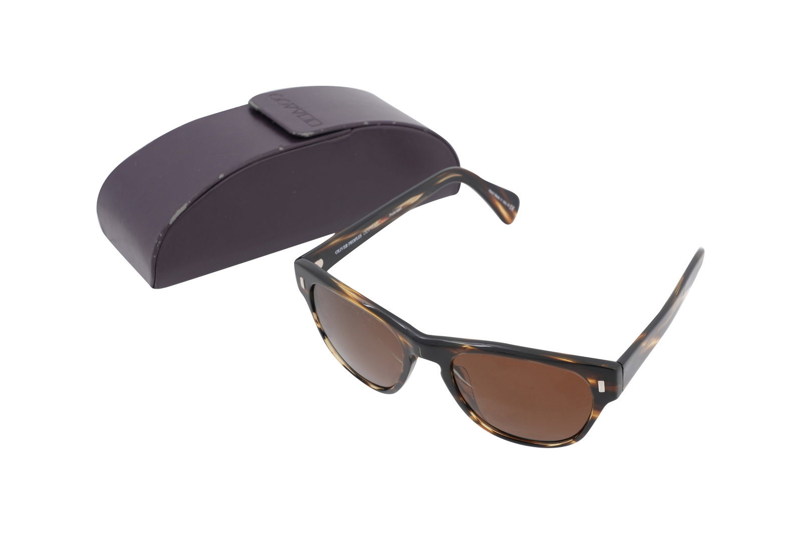 A PAIR OF OLIVER PEOPLES TORTOISESHELL ACETATE SUNGLASSES Designed in the US, made in Italy, c.: A PAIR OF OLIVER PEOPLES TORTOISESHELL ACETATE SUNGLASSES Designed in the US, made in Italy, c. late 20th century A refined and characteristically understated pair of Oliver Peoples sunglasses, crafte