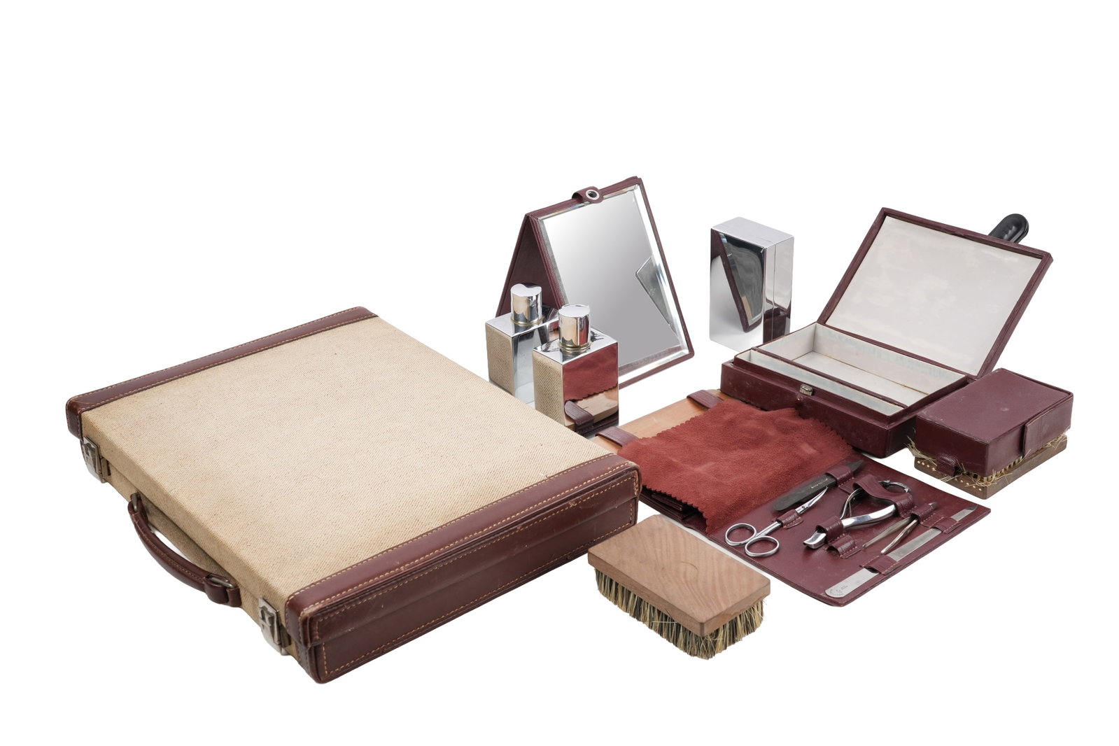 AN HERMÈS BEIGE CANVAS AND BROWN LEATHER GENTLEMAN'S GROOMING CASE France, c.1950s (1 of 13)