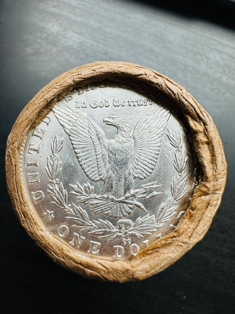 AU $10 Morgan Silver Dollar Roll CC & CC Ends: Original $10 face value roll of Morgan Silver Dollars in About Uncirculated (AU) condition, featuring Carson City (CC) mint mark coins on both visible ends. The roll remains sealed to preserve origina