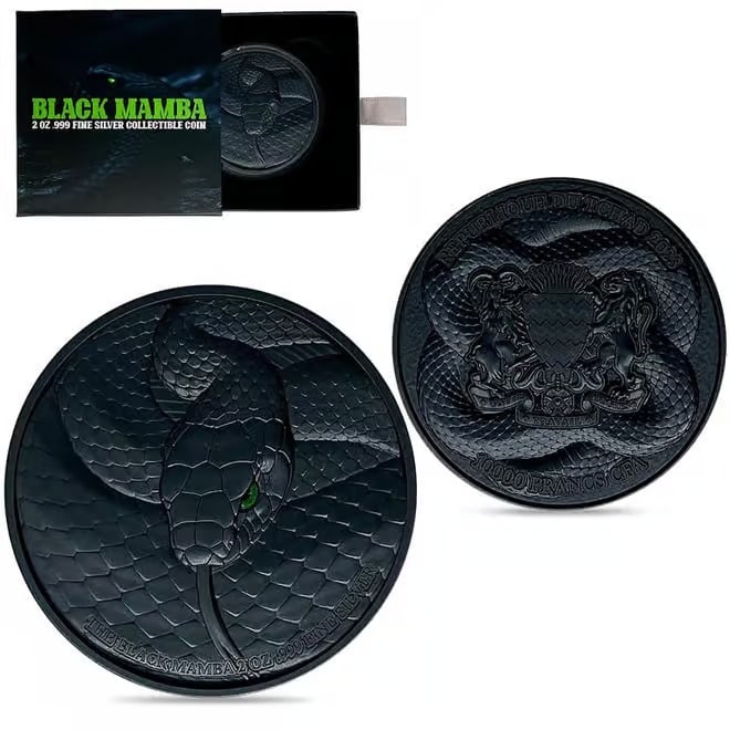 2023 Chad 2 oz Silver Black Mamba High Relief Coin .999 Fine (w/Box): 2023 Chad 2 oz Silver Black Mamba High Relief Coin (w/Box) 2 oz .999 fine silver High Relief coin featuring a coiled, ready-to-strike Black Mamba design and the Chad coat of arms on the obverse.