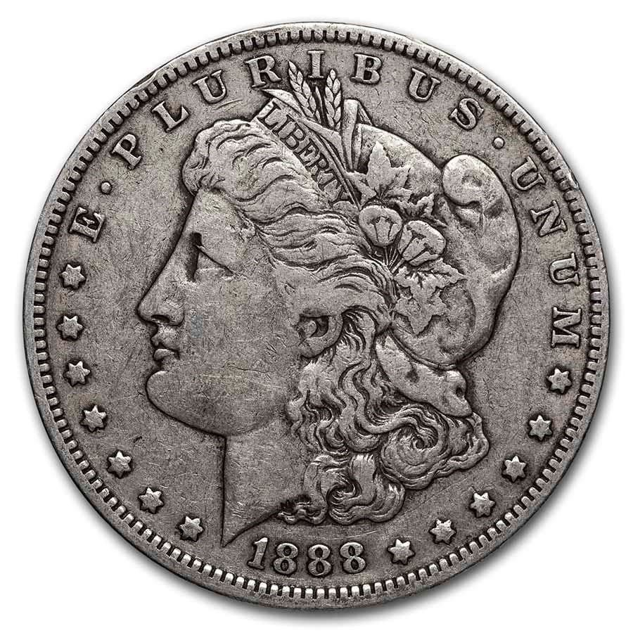 Morgan Silver Dollar Fine Condition 1888-O: This 1888-O Morgan Silver Dollar was struck at the New Orleans Mint and is a classic piece of American coinage history. The coin features the iconic Liberty design by George T. Morgan and the majestic
