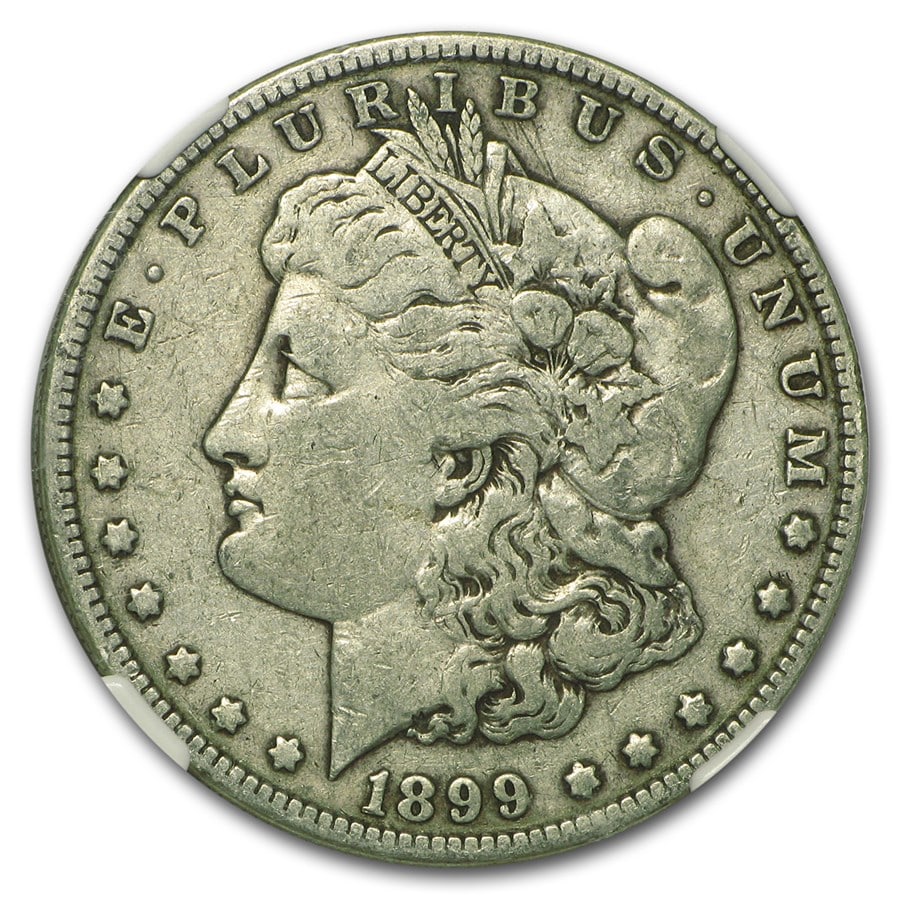 Morgan Silver Dollar G-VG 1899: 1899 Morgan Silver Dollar struck at the historic Philadelphia Mint and designed by George T. Morgan a scarce low-mintage issue with just 330,000 produced, showcasing the iconic Liberty and eagle desig