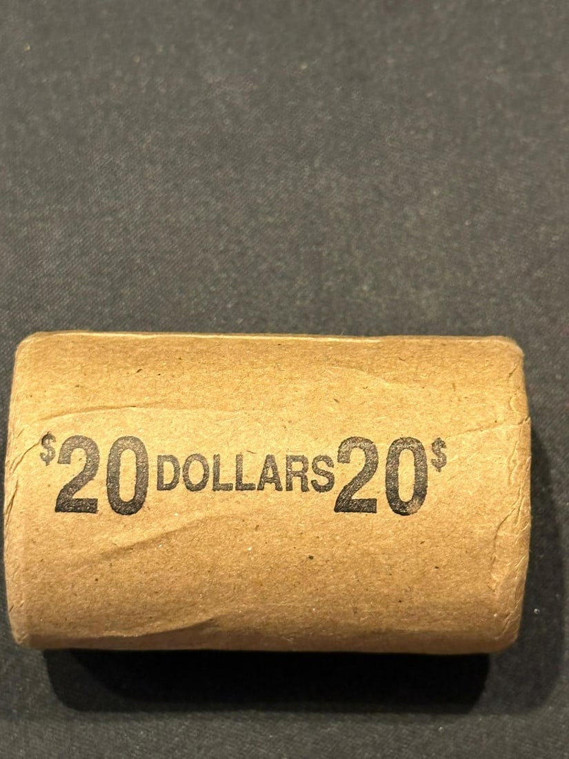 BU $20 1990 & 1990 1 oz Silver American Eagle Roll: This original Brilliant Uncirculated (BU) sealed roll contains 20 American Silver Eagle coins, each struck in 1 troy ounce of .999 fine silver. The roll features a 1990 coin on one end and a 1990 coin