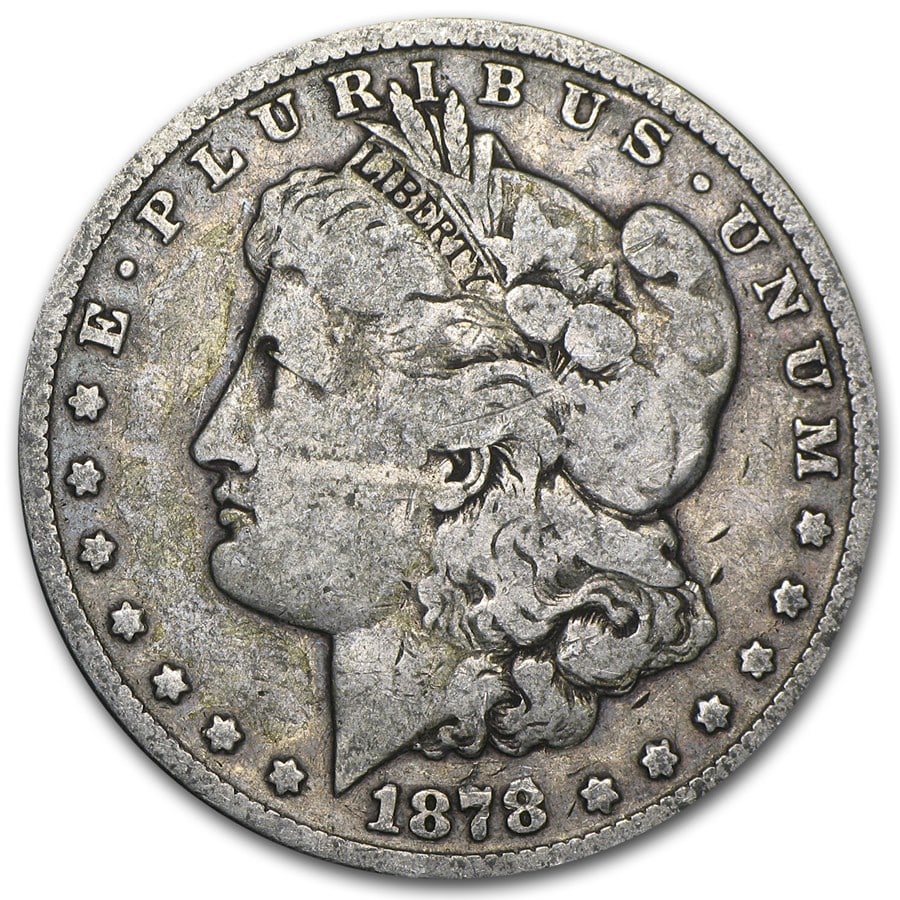 Morgan Silver Dollar G-VG 1878-CC: 1878-CC Morgan Silver Dollar from the legendary Carson City Mint — first year of issue with the iconic “CC” mark and only 2.2M struck, offered here in Good–Very Good condition with strong