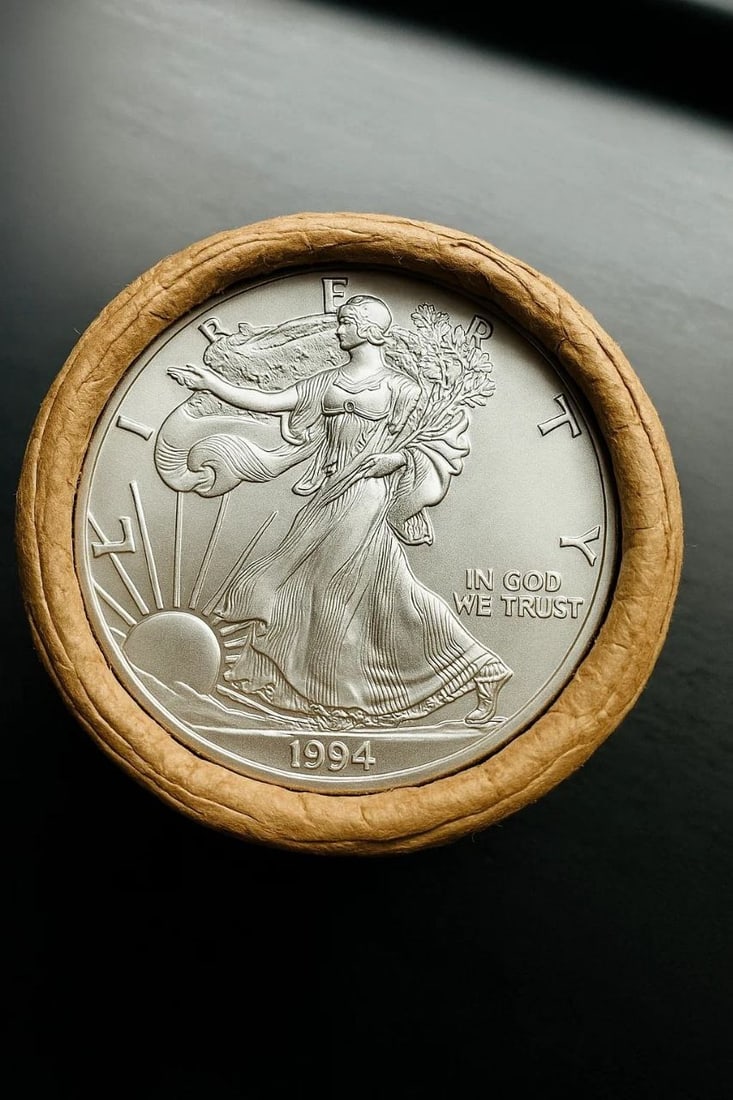 BU $20 1994 & 1994 1 oz Silver American Eagle Roll: This original Brilliant Uncirculated (BU) sealed roll contains 20 American Silver Eagle coins, each struck in 1 troy ounce of .999 fine silver. The roll features a 1994 coin on one end and a 1994 coin
