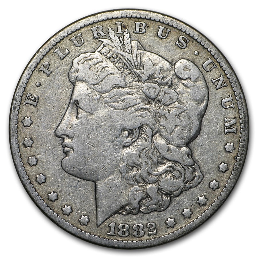 Morgan Silver Dollar Very Fine Condition 1882-CC: 1882-CC Morgan Silver Dollar struck at the legendary Carson City Mint — a coveted “CC” issue with just 1.1 million minted, making it a standout low-mintage prize among all Morgan mintmarks.