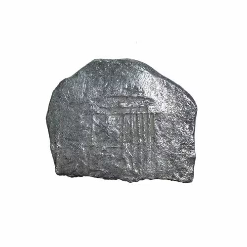 Atocha Shipwreck Silver Cob Fragment TSI#85A-223992: The Atocha Shipwreck Silver Cob Fragment TSI#85A-223992 is an authentic piece of history recovered from the famous Nuestra Se?ora de Atocha Shipwreck. This silver cob fragment represents Spanish colon