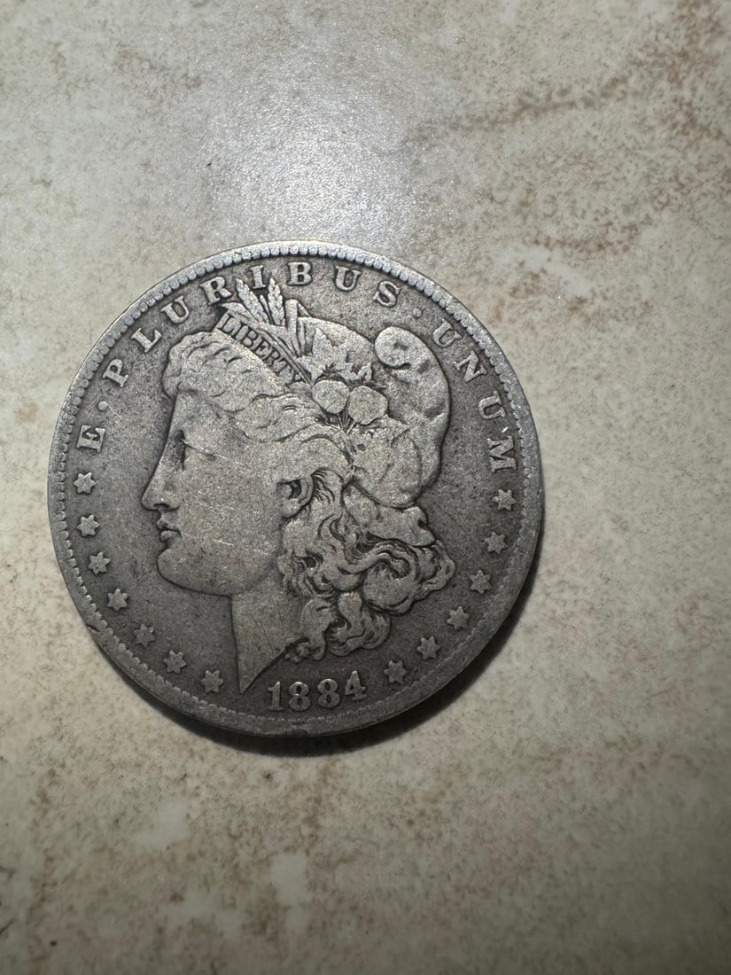 1884-O Morgan Dollar XF40 (Non-Graded): The 1884-O Morgan Dollar XF40 (Non-Graded) is a New Orleans Mint issue with strong detail and moderate wear. Its XF40 grade ensures good visual appeal with clear design features.