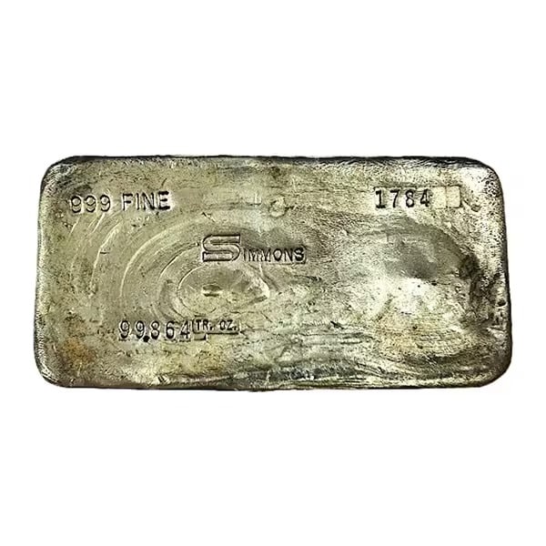 Vintage Simmons 100oz Silver Bar: The Vintage Simmons 100 oz Silver Bar is a monumental piece of American bullion history, representing the golden age of private mid-20th-century refining. Struck in .999 fine silver, this substantial 