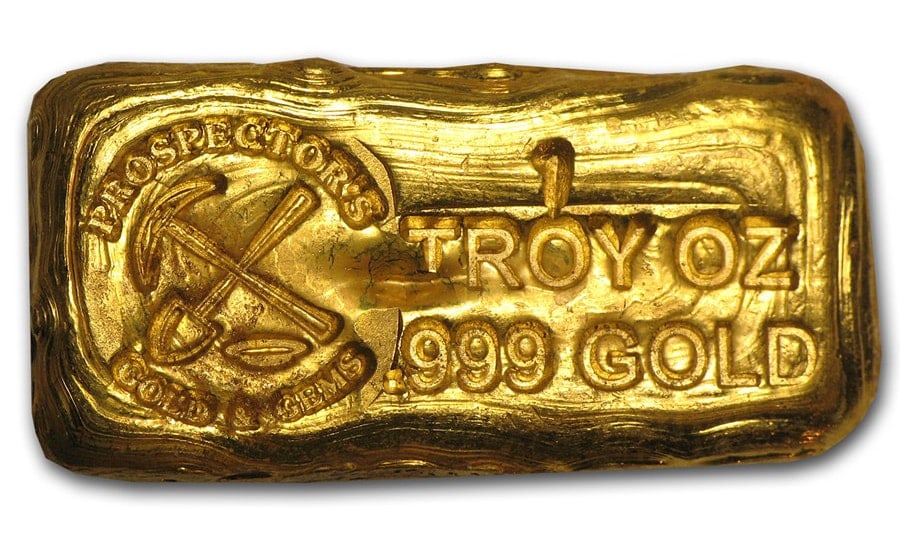 Prospector Gold & Gems 1 Ounce Poured Gold Bar: The Prospector Gold & Gems 1 oz Poured Gold Bar is a handcrafted bullion piece produced by Prospector Gold & Gems, struck in .999+ fine gold and weighing 1 troy ounce. With its rustic poured style and
