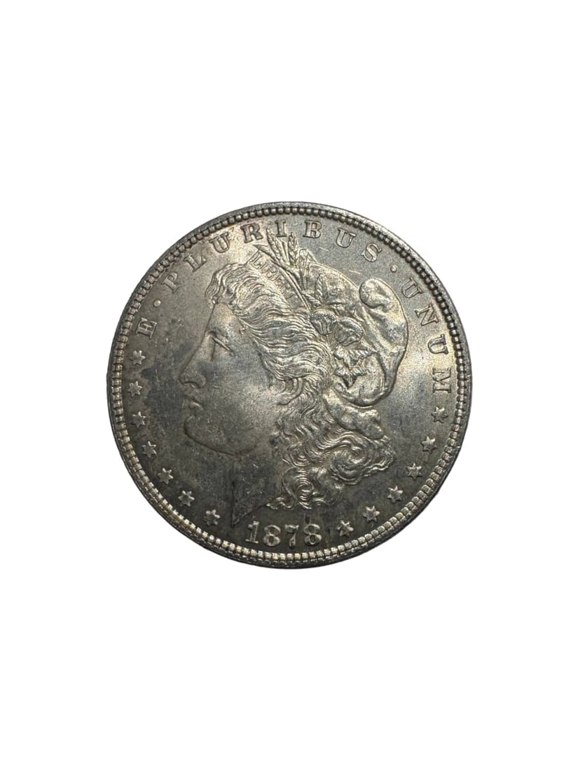 1878- Morgan dollar 7 Tail feather: The 1878 Morgan Dollar with 7 tail feathers is an early and historically significant variety. It represents a design correction made shortly after the series began. Struck in 90% silver, it contains 0
