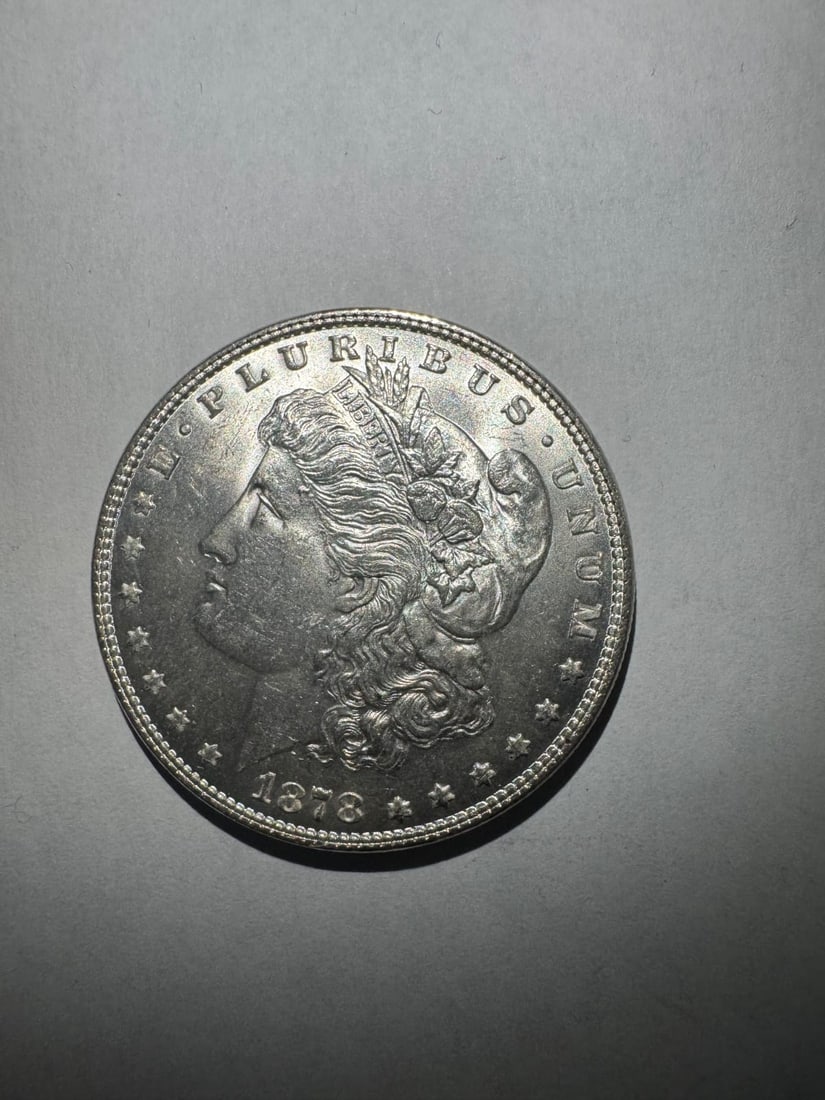 1878- Morgan dollar 7 TF: The 1878 Morgan Dollar 7 TF variety represents one of the earliest refinements in coin design. It showcases the iconic Liberty portrait and detailed eagle reverse. Made of 90% silver, it contains 0.77