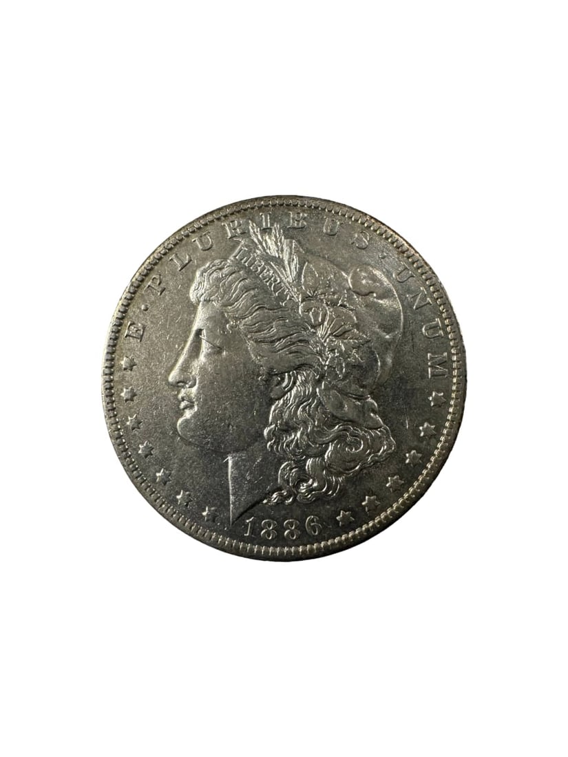 1886-O Morgan dollar BU: The 1886-O Morgan Dollar from the New Orleans Mint is a popular Southern mint issue. In Brilliant Uncirculated (BU) condition, it exhibits full mint luster and sharp design details. Made of 90% silver