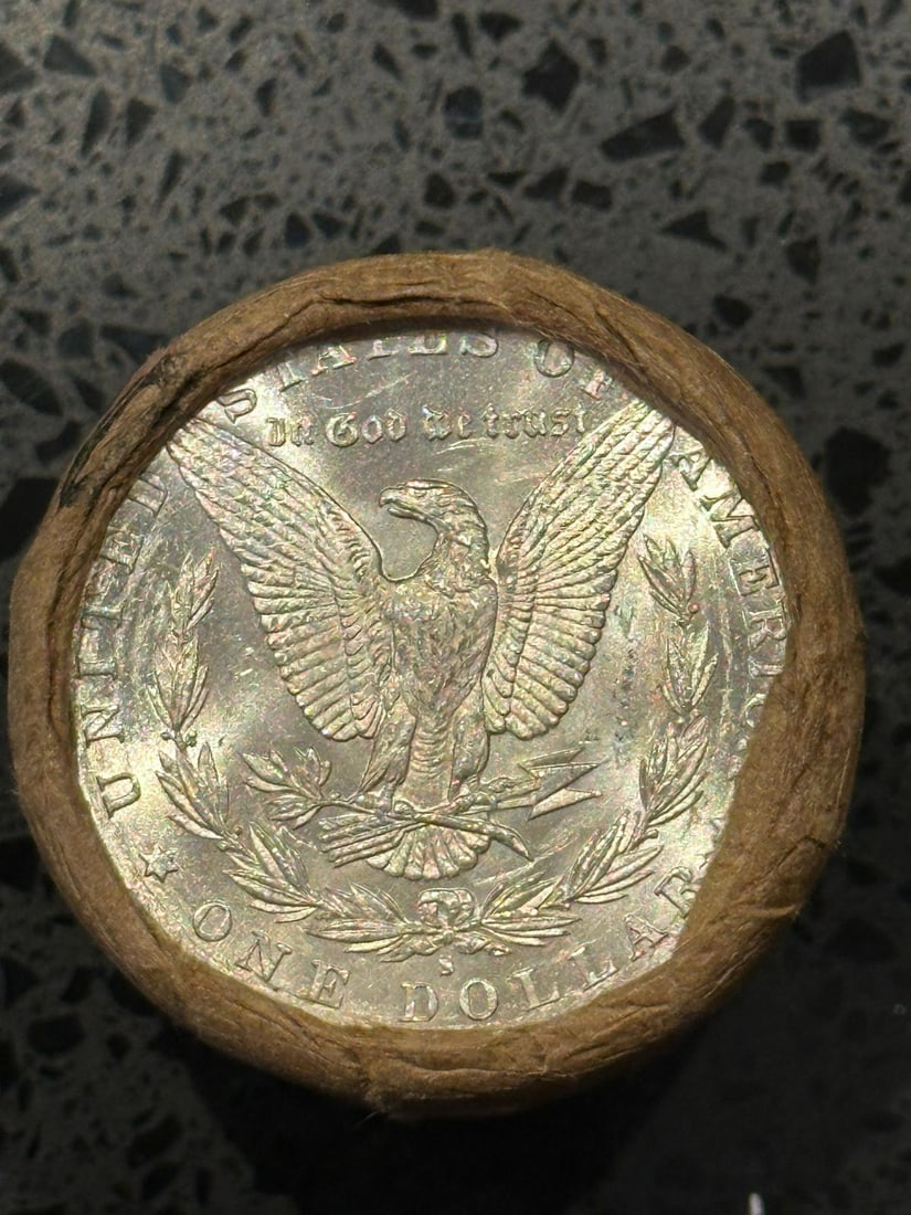 BU $10 Morgan Silver Dollar Roll S & S Ends: An original Brilliant Uncirculated (BU) sealed roll of Morgan Silver Dollars, featuring a San Francisco (S) Mint coin on both ends. The roll remains sealed, with only the front and back coins visible.