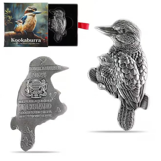 2024 Chad 1 oz Silver Kookaburra Shaped High Relief Coin .999 Fine: This 2024 Chad 1 oz Silver Kookaburra Coin is a finely detailed shaped piece struck in .999 fine silver. Featuring high-relief engraving, it captures the iconic bird in lifelike form. The sculpted des