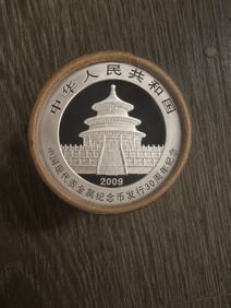 $20 2009 & 2009 End Chinese Silver Panda roll: This original roll contains 20 Chinese Silver Panda coins with 2009-dated coins displayed on both ends for attractive presentation. Struck in fine silver by the Chinese Mint, Silver Pandas are one of 