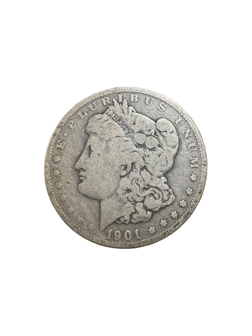 Morgan dollar 1901-VG: The 1901 Morgan Silver Dollar is a classic U.S. coin struck in 90% silver. Featuring the iconic Lady Liberty and eagle design, it represents the rich history of American coinage. In Very Good (VG) con