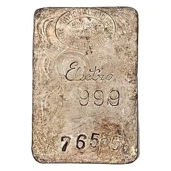 24.6 oz National India Bullion Refinery Bombay Electro Silver Bar: This 24.6 oz Silver Bar from National India Bullion Refinery, Bombay, is a rare vintage issue. Featuring electro-refined silver, it reflects historic Indian bullion production. Its unusual weight adds