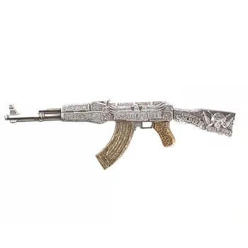 2024 Chad 2 oz Silver Assault Rifle Gilded Shaped Coin .999 Fine: The 2024 Chad 2 oz Silver Assault Rifle Gilded Shaped Coin is a bold, .999 fine silver collectible that merges military history with high-end numismatic artistry. This limited-edition release features