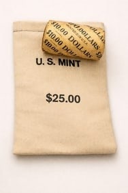 BU $10 1997 & 1997 End 1 oz Silver American Eagle & $25 Random 1 oz Silver American Eagle $1 Coin BU: This premium lot includes one sealed $10 roll of Brilliant Uncirculated 1997 American Silver Eagles featuring 1997-dated coins on both ends, along with a $25 mixed bag of random-date BU American Silve