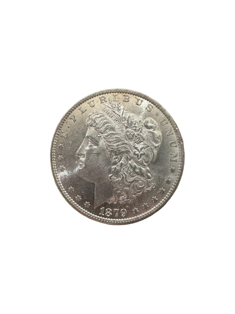 Morgan dollar 1879-O BU: The 1879-O Morgan Silver Dollar was minted in New Orleans and struck in 90% silver. It showcases the timeless Morgan design with sharp details and strong eye appeal. In Brilliant Uncirculated (BU) con