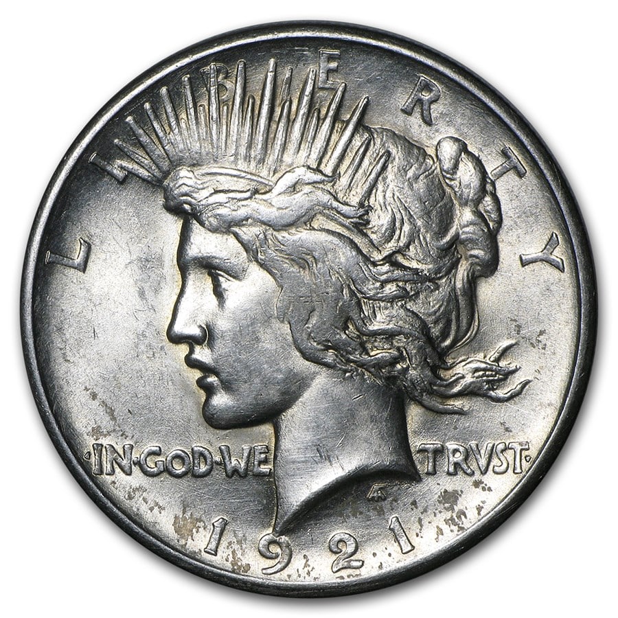 1921- Peace Silver Dollar Cracked From Roll: The Peace Dollar 1921 (Cracked From Roll) marks the debut year of the iconic Peace series, struck in 90% silver to commemorate post-WWI peace. Featuring bold high-relief design and fresh uncirculated 