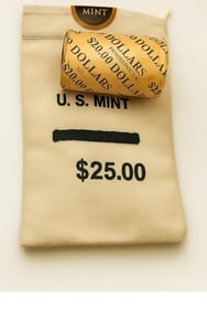 BU $20 1997 & 1997 End 1 oz Silver American Eagle & $25 Random 1 oz Silver American Eagle $1 Coin BU: This premium lot includes one sealed $20 roll of Brilliant Uncirculated 1997 American Silver Eagles featuring 1997-dated coins on both ends, along with a $25 mixed bag of random-date BU American Silve