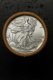 BU $10 1990 & 1990 1 oz Silver American Eagle $1 Coin Roll: This original Brilliant Uncirculated (BU) sealed roll contains 10 American Silver Eagle coins, each struck in 1 troy ounce of .999 fine silver. The roll features a 1990 coin on one end and a 1990 coin