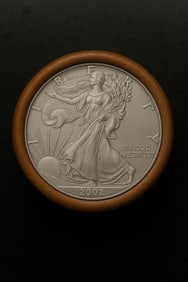 BU $20 2002 & 2002 1 oz Silver American Eagle $1 Coin Roll: This original Brilliant Uncirculated (BU) sealed roll contains 20 American Silver Eagle coins, each struck in 1 troy ounce of .999 fine silver. The roll features a 2002 coin on one end and a 2002 coin