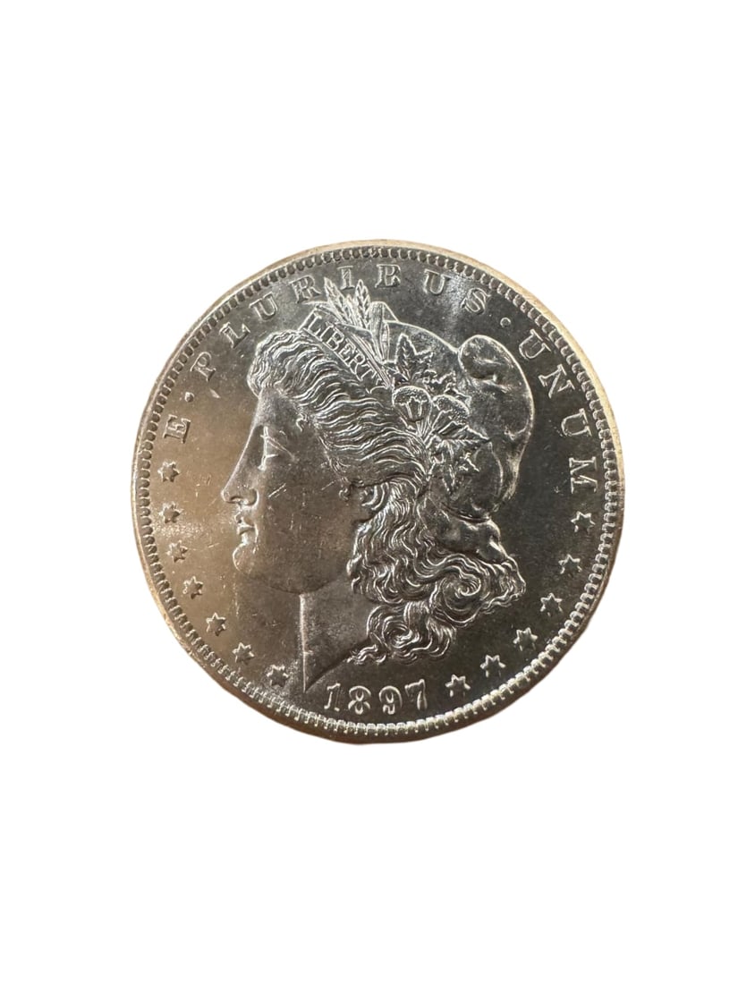 Morgan dollar 1897-S BU: The 1897-S Morgan Silver Dollar is a premium issue struck at the San Francisco Mint. Composed of 90% silver, it features sharp details and the classic Liberty and eagle design. In Brilliant Uncirculat