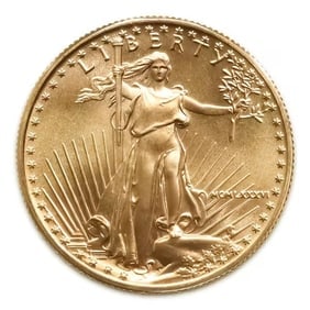 1986 American Gold Eagle 1/2 oz Uncirculated: 1986 American Gold Eagle 1/2 oz ($25 Face Value), struck by the esteemed United States Mint and backed by the U.S. government for weight and purity. Minted in durable 22-karat crown gold (.9167 fine),