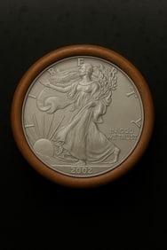 BU $10 2002 & 2002 1 oz Silver American Eagle $1 Coin Roll: This original Brilliant Uncirculated (BU) sealed roll contains 10 American Silver Eagle coins, each struck in 1 troy ounce of .999 fine silver. The roll features a 2002 coin on one end and a 2002 coin