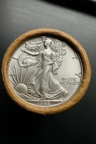 BU $10 1988 & 1988 1 oz Silver American Eagle $1 Coin Roll: This original Brilliant Uncirculated (BU) sealed roll contains 10 American Silver Eagle coins, each struck in 1 troy ounce of .999 fine silver. The roll features a 1988 coin on one end and a 1988 coin