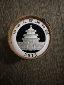 $10 2013 & 2013 End Chinese Silver Panda roll: This original roll contains 10 Chinese Silver Panda coins, each weighing 1 oz of fine silver, with 2013-dated coins displayed on both ends for attractive presentation. Struck in fine silver by the Chi