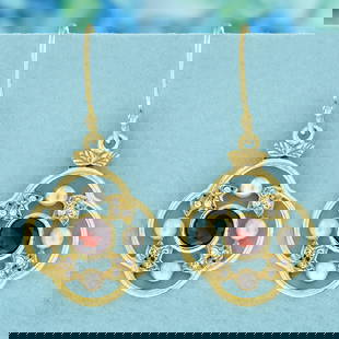 9K Yellow Gold Natural Garnet Pearl Diamond Floral Earrings: CHARACTERISTICSMetal: Solid 9K Yellow Gold Earrings Size: 18 x 35 mm.Total Gemstones Weight: 2.65 carat (approx.)Total Gram Weight: 4.00 g. (approx.)*Pictures have been enlarged to show details*PRIMAR