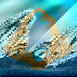 9K Gold  Natural Marquise Blue Topaz Vintage Style Filigree Ring: CHARACTERISTICSMetal: Solid 9K Yellow GoldRing Size: US 7Total Gemstones Weight: 3.70 carat (approx.)Total Gram Weight: 2.90 g. (approx.)*Pictures have been enlarged to show details*PRIMARY STONE(S)St