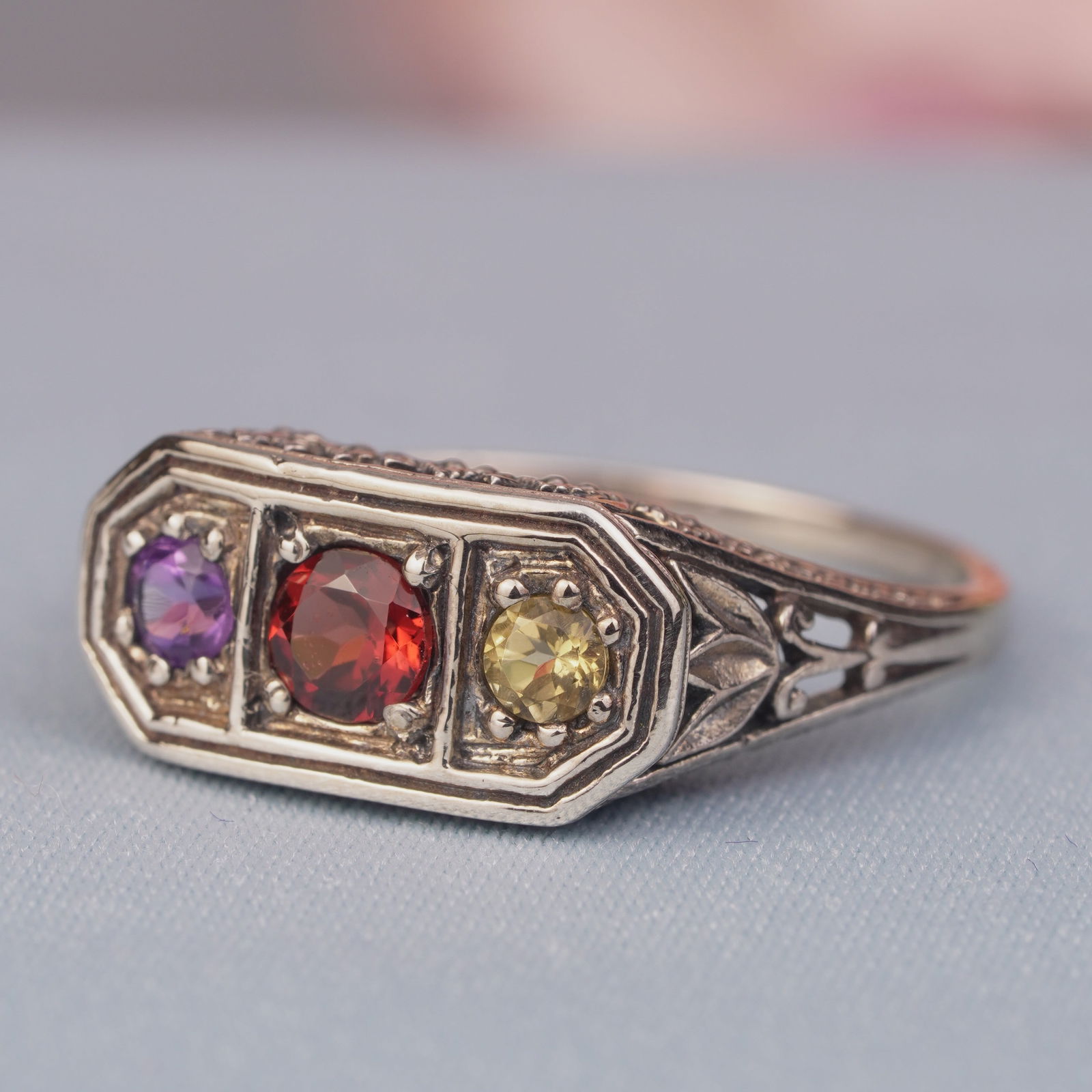 Silver925 Natural Garnet Citrine Amethyst Vintage Filigree Ring: CHARACTERISTICSStatus: In stockOrigin: ThailandMetal: Silver 925Ring Size: US 8Total Gemstones Weight: 0.61 carat. (approx.)Total Gram Weight: 2.72 g. (approx.)*Pictures have been enlarged to show det
