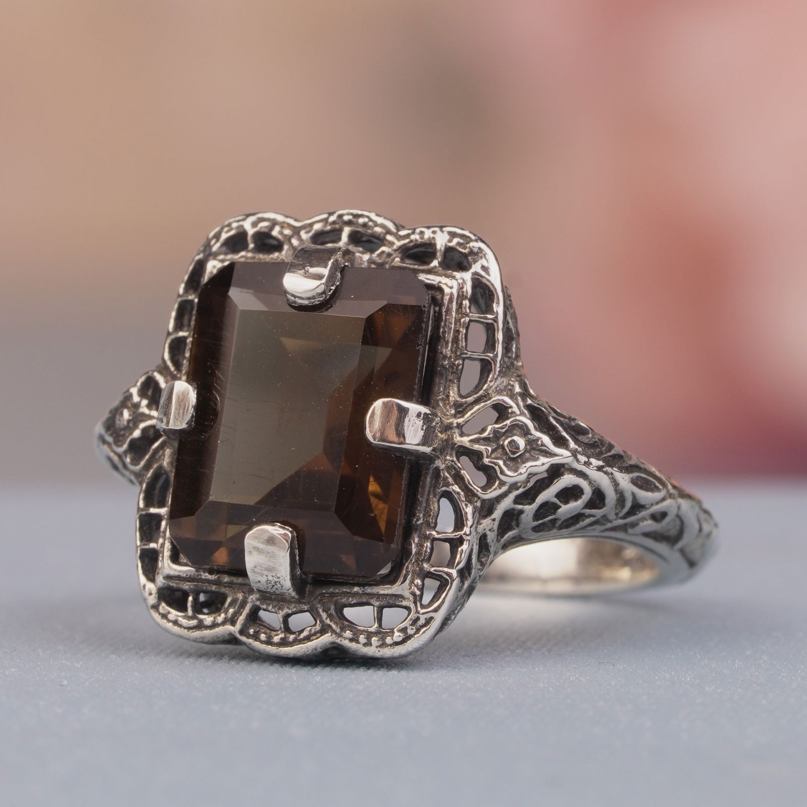 Silver925 Natural Smoke Quartz Vintage Filigree Ring: CHARACTERISTICSStatus: In stockOrigin: ThailandMetal: Silver 925Ring Size: US 5Total Gemstones Weight: 3.02 carat. (approx.)Total Gram Weight: 3.28 g. (approx.)*Pictures have been enlarged to show det