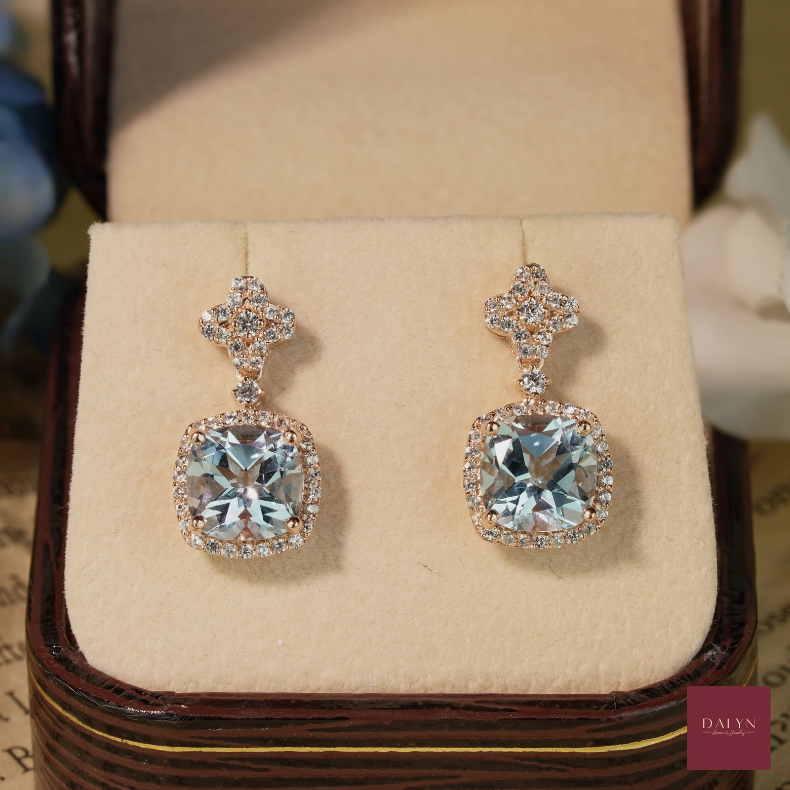 18K Rose Gold Plate Sterling Silver Natural Sky Blue Topaz and White Zircon Dangle Earrings: 18K Rose Gold Plate Sterling Silver Natural Sky Blue Topaz and White Zircon Dangle Earrings Stone: Natural Sky Blue Topaz and White Zircon Metal: Gold plated silver 925 Approx. Weight: 4.56 g. Approx.