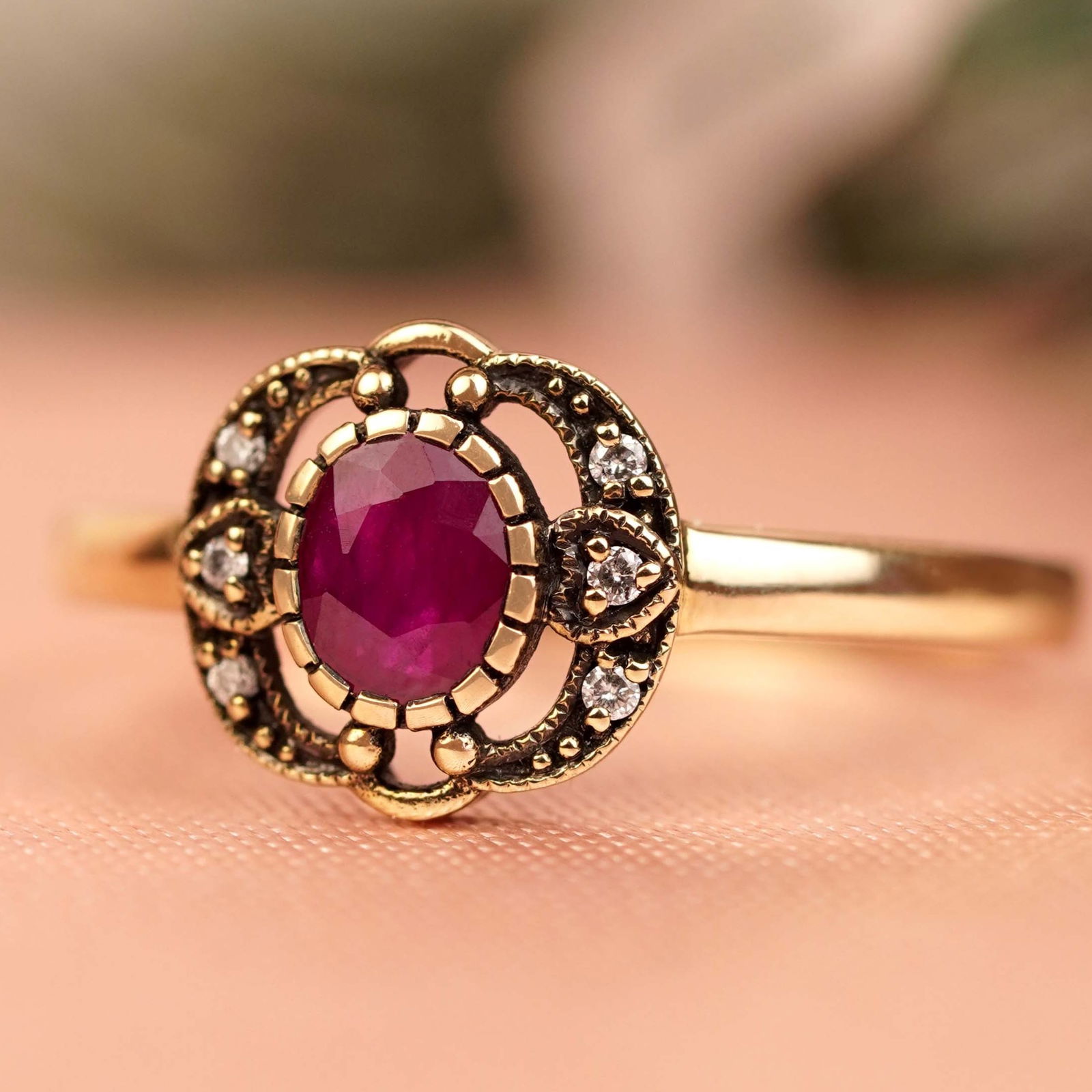 9K Yellow Gold Natural Ruby and Diamond Vintage Style Ring: CHARACTERISTICSOrigin: ThailandMetal: Solid 9K Yellow GoldRing Size: US 7Total Gemstones Weight: 0.43 carat. (approx.)Total Gram Weight: 1.38 g. (approx.)*Pictures have been enlarged to show details*P