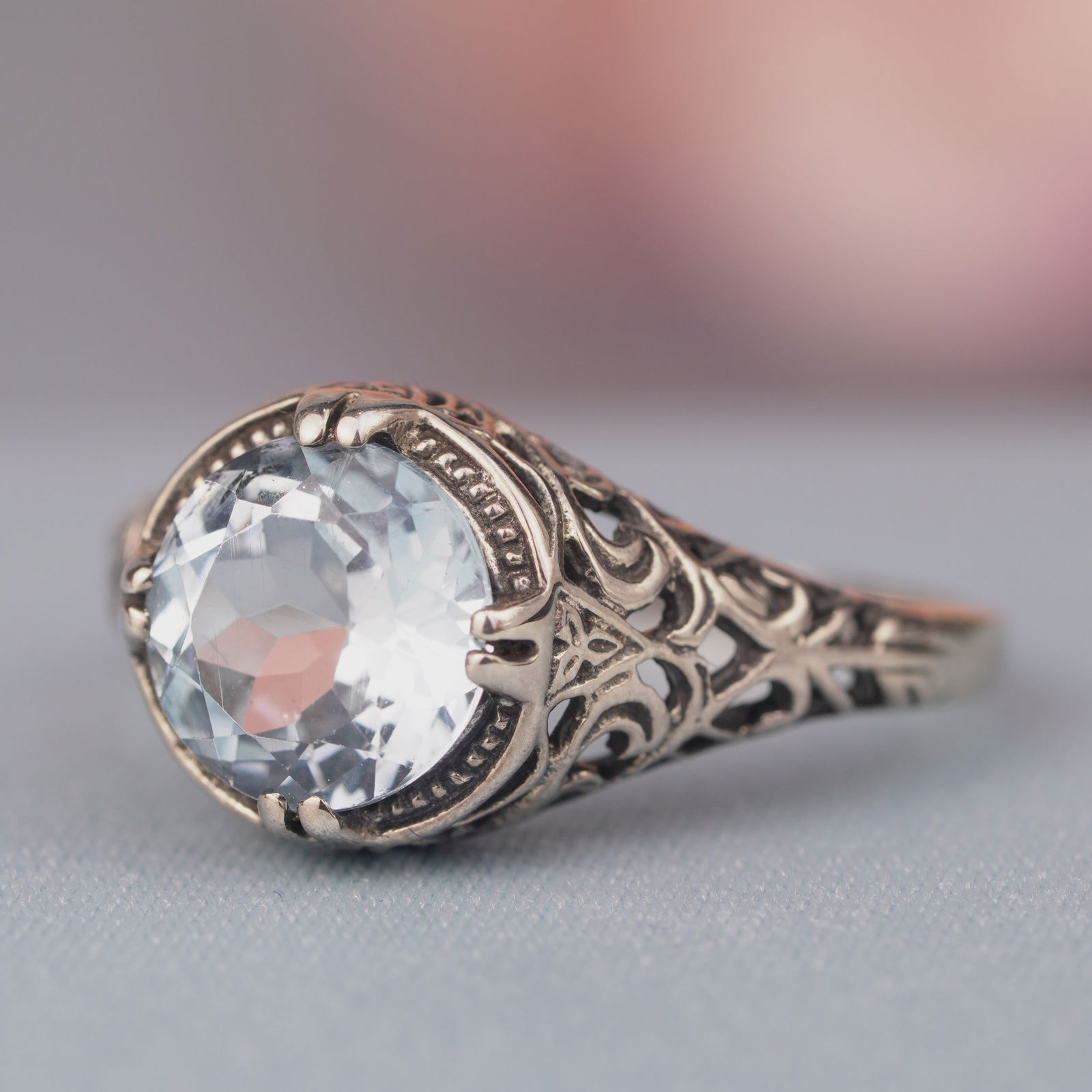 Silver925 Natural Blue Topaz Vintage Filigree Ring: CHARACTERISTICSStatus: In stockOrigin: ThailandMetal: Silver 925Ring Size: US 7.25Total Gemstones Weight: 2.27 carat. (approx.)Total Gram Weight: 2.27 g. (approx.)*Pictures have been enlarged to show