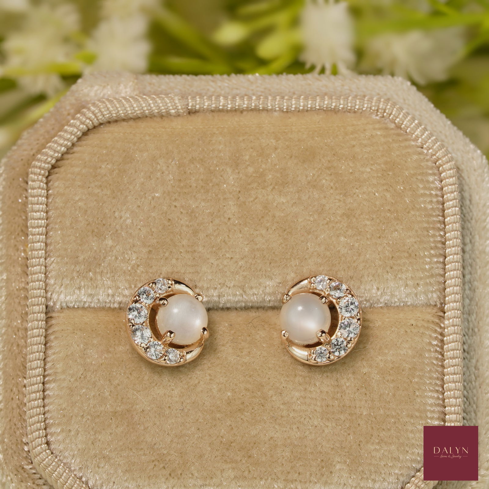 18K Rose Gold Plate Sterling Silver Natural Moonstone and White Zircon Stud Earrings: 18K Rose Gold Plate Sterling Silver Natural Moonstone and White Zircon Stud Earrings Stone: Natural Moonstone and White Zircon Metal: Gold plated silver 925 Approx. Weight: 1.84 g. Approx. Gemstone We