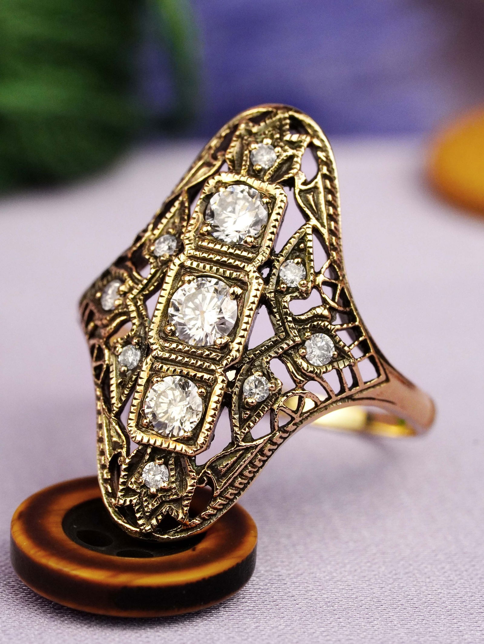 14K Yellow Gold Natural Diamond Vintage Style Filigree Dinner Ring: CHARACTERISTICSOrigin: ThailandMetal: Solid 14K Yellow GoldRing Size: US 7Total Gemstones Weight: 0.48 carat. (approx.)Total Gram Weight: 2.85 g. (approx.)*Pictures have been enlarged to show details*